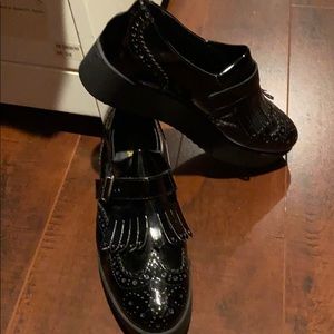 Patent leather platform loafers